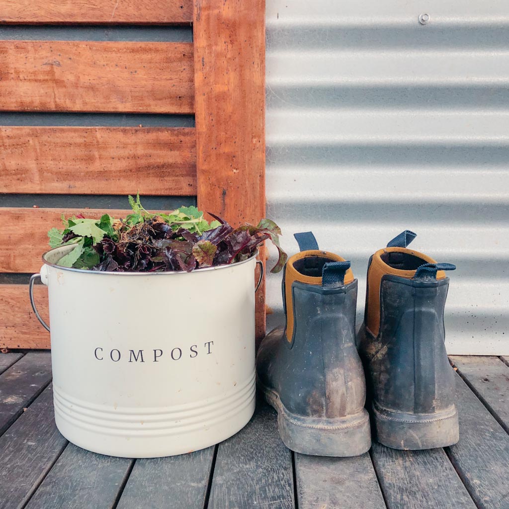 Compost bucket and gumboots